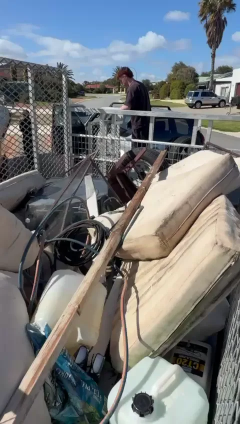 A No Junk Perth trailer loaded with household rubbish for removal