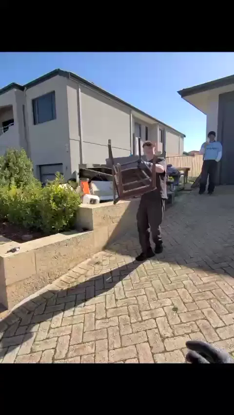 No Junk Perth team member removing a chair from a residential property